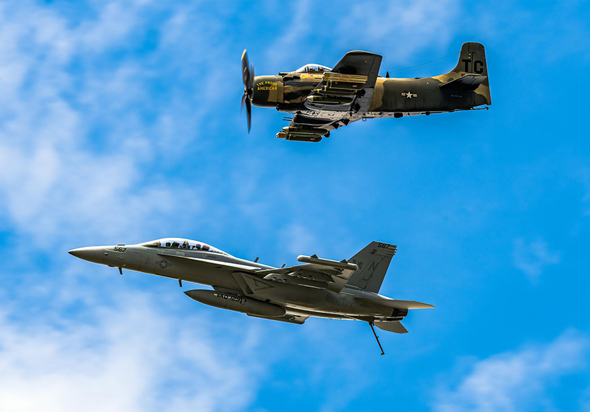A-1 Skyraider and EA-18 Growler in flight