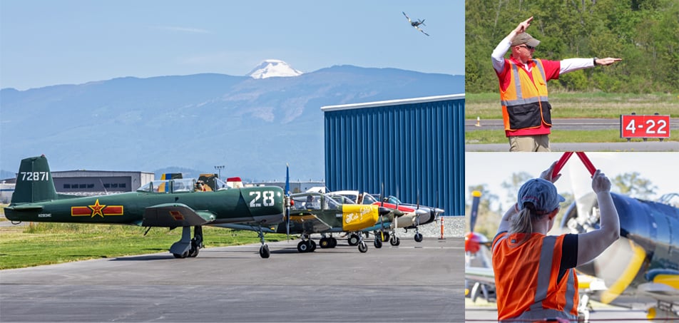 Aircraft parked on the ramp at Heritage Flight Museum: marshallers guiding planes on the flight line